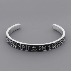 Detailed view of Viking Thor Hammer bangle with Nordic runes and Celtic knot texture
