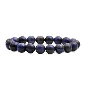 Polished natural blue tiger eye bead bracelet with hawk eye effect on white background