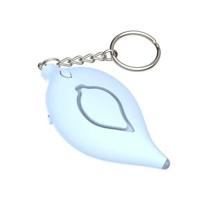 Close-up of leaf-shaped personal security alarm in light blue with silver keychain