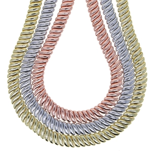 Detail of 10mm wide tennis chains in gold, silver and rose gold with twisted link design
