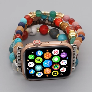 Detail of colorful multilayer beaded elastic strap with wooden accents for Apple Watch