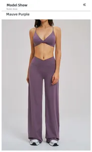 Detailed front view of mauve yoga set featuring twisted crop top and V-waist wide leg pants
