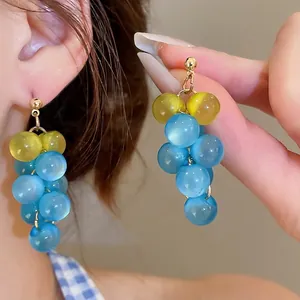 Creative grape-shaped dangle earrings with translucent blue and yellow resin beads