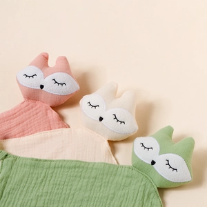 Three-pack cotton muslin baby security blankets with cute fox plush heads in soft pastel colors