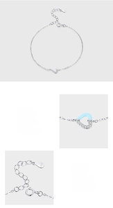 Detailed view of S925 sterling silver bracelet with micro-set heart and blue enamel