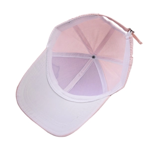 Pink cotton baseball cap with adjustable strap and internal sweatband detail view