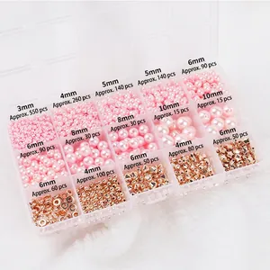 Kit bijoux avec perles blanches et perles d'espacement dorées en boîte de 15 compartiments