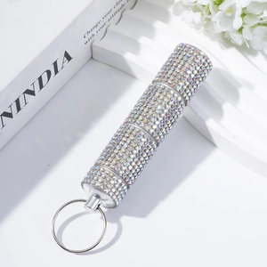 Rainbow rhinestone pill bottle keychain with three-tier storage and silver metal ring