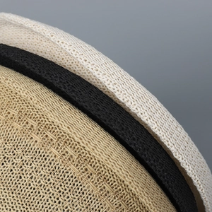 Detailed close-up showing the intricate knit texture and multi-color weaving of summer sun hats