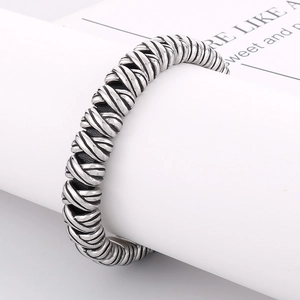 Retro braided stainless steel bracelet for men with oxidized silver finish and motor style