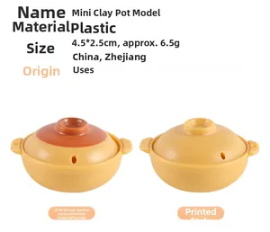 Detailed macro view of 4.5x2.5cm miniature ABS plastic casserole models for dollhouses
