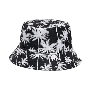 Classic black bucket hat with white palm tree print for summer sun protection outdoors