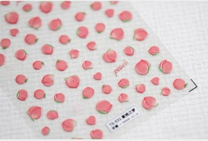 Macro d'autocollants 5D pour ongles avec pêches et cœurs et détails texturés en 3D