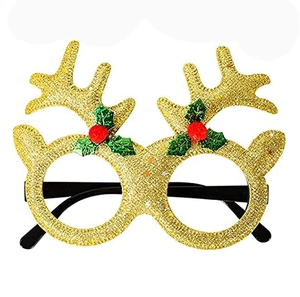Detailed close-up of golden reindeer antler Christmas party glasses with glitter finish