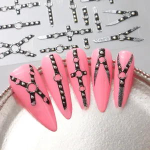 Detailed macro view of 5D embossed gothic nail stickers with dark punk rivet designs