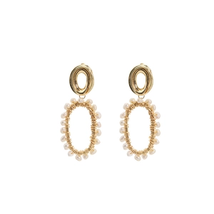 Golden double oval hoop earrings with wrapped white pearls on a clean white background