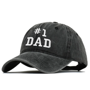 Detail of #1 DAD embroidery on dark washed cotton baseball cap with adjustable metal buckle