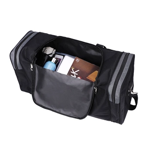 Top view of a black travel bag with spacious main compartment for books and tablet