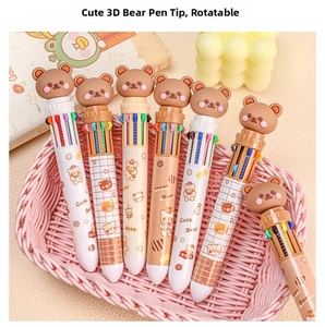 Dettaglio di penne a sfera multicolore con simpatiche teste di orso in silicone rotanti