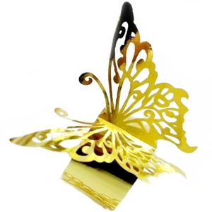 Elegant gold butterfly napkin ring with hollow design and shiny metallic mirror finish