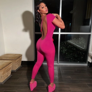 Macro shot of backless design and stretchy knit fabric of the rose pink jumpsuit