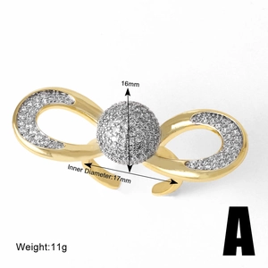 Macro detail of gold bow ring with full zircon pave and measurements of 16mm and 11g