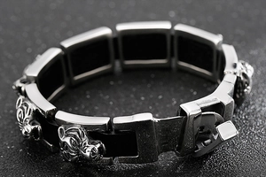 Close-up of a carved tiger head on a stainless steel men's hip hop bracelet