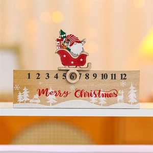 Close-up of wooden Christmas countdown calendar with sliding Santa sleigh pointer
