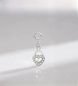 Close-up of S925 sterling silver heart lock pendant with micro-set cubic zirconia