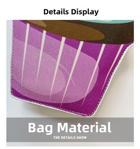 Close-up of purple bag fabric with white stripes, circular patterns and fine stitching
