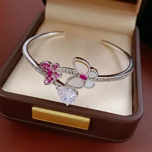 Pink zircon butterfly open cuff bracelet with a pear-cut water drop pendant