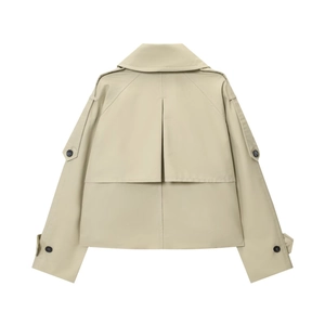 Rear view of khaki short trench coat featuring back storm flap and buttoned shoulder straps