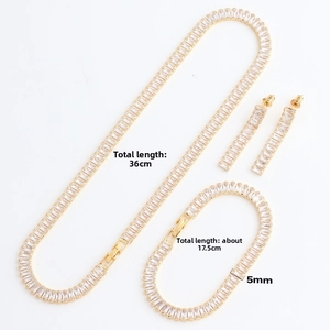Detailed set of zircon necklace, bracelet and earrings showing 36cm and 17.5cm lengths