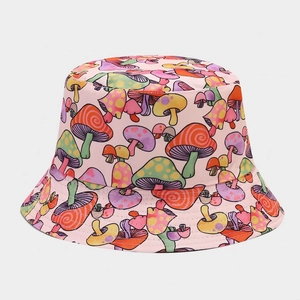 Detailed pattern of colorful mushrooms on a light pink double-sided bucket hat