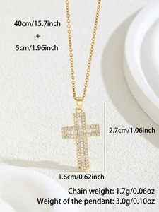 Macro detail of gold cross pendant with cubic zirconia and technical dimensions