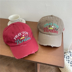 Distressed cotton baseball cap with PRAY FOR Birdies embroidery in burgundy and khaki