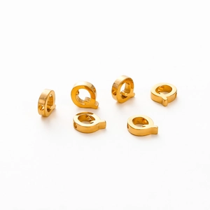Detail showing gold-plated letter Q beads with 1.8mm hole for DIY jewelry making