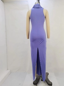 Detail view of the purple sleeveless maxi dress featuring a high back slit design