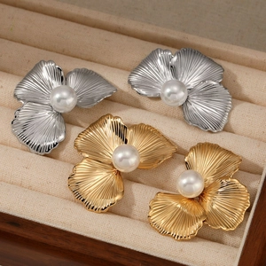 Elegant floral pearl stud earrings in gold and silver finish for women's jewelry