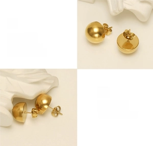 Detailed view of polished gold dome earrings with mirror finish and butterfly backs