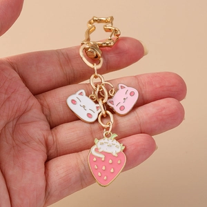 Handheld creative metal heart cat keychain with pink strawberry and enamel charms