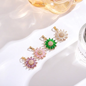 Gold-plated daisy flower pendants with colorful cubic zirconia in four vibrant colors