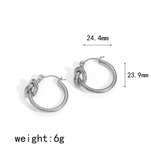 Detailed dimensions of silver knotted hoop earrings showing 24.4mm width and 6g weight