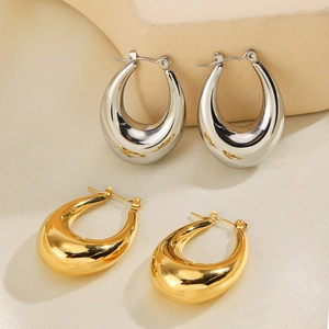 Minimalist U-shaped oval hoop earrings in polished gold and silver stainless steel finishes