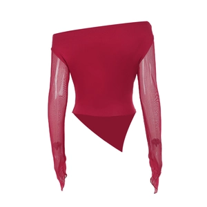 Detail of burgundy off-shoulder top with sheer mesh sleeves and asymmetric hemline