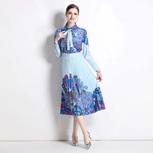 Elegant light blue long sleeve shirt with bow tie and floral pleated skirt set