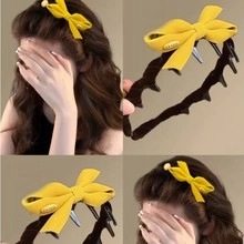 Macro detail of large yellow bow plush hair claw clip and stylish side-view model shots