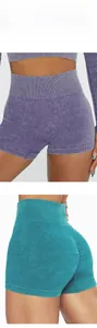 Macro detail of high-waist seamless knit yoga shorts with scrunch butt lifting texture