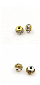 Detailed size specifications for vintage 9mm alloy barrel beads with geometric patterns