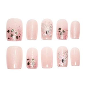 Pink press-on nails with butterfly designs, silver sequins and sparkling rhinestones